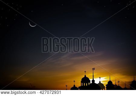 Ramadan Kareem Religion Symbols. Mosques Dome In Twilight Night With Crescent Moon And Sky Dark Blac