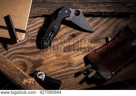 Edc Accessories And Empty Space In The Center. Pocket Knife And Copy Space. Edc Knife.