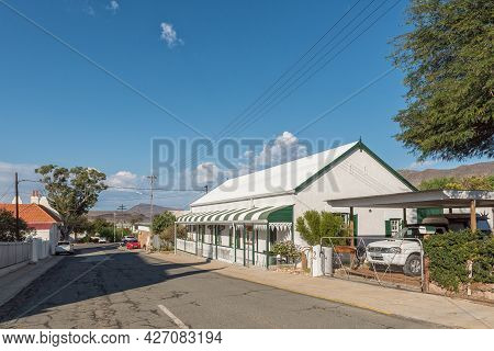 Prince Albert, South Africa - April 20, 2021: A Street Scene, With An Art Studio In A Historic House