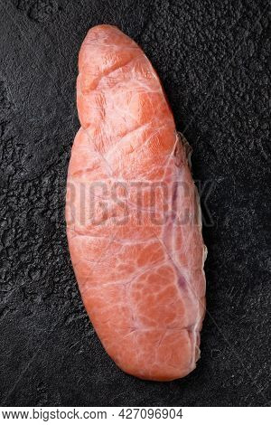 Raw Cod Fish Roe Protein Delicacy On Black Stone Background