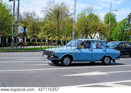 Bucharest, Romania, 24 April 2021 Old Retro Vivid Blue Romanian Dacia 1310 Classic Car In Traffic In