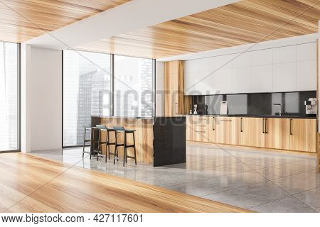 Corner Of The Kitchen Interior With Bar Stools. Panoramic Windows. Half White Wooden Cabinet With Bl
