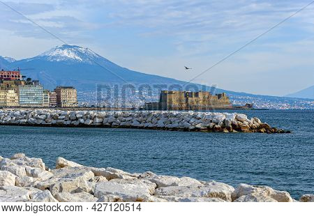 Looking At The Historic Marina Area Borgo Marinari, Bay Of Naples And Mount Vesuvio