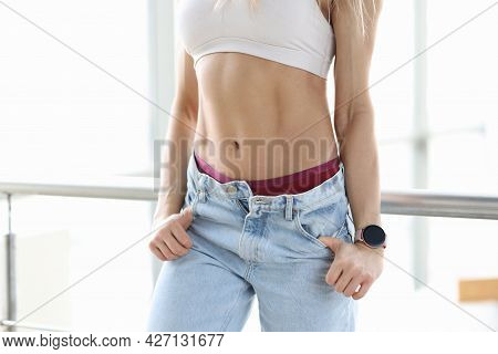 Sporty Girl Showing Well Trained Body Closeup