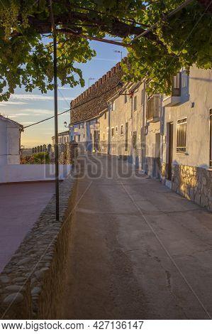 Galisteo, Beautiful Walled Town From Alagon Valley. Whitewashed House Attached To Wall. Extremadura,