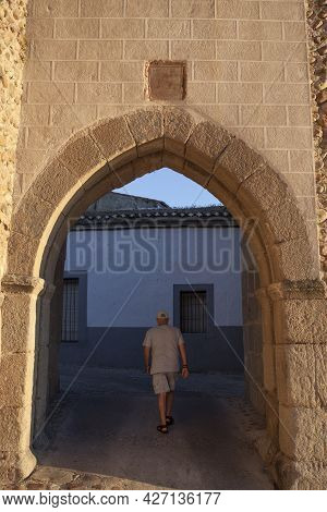 Galisteo, Beautiful Walled Town From Alagon Valley. Mature Man Going Into West Enclosure. Extremadur