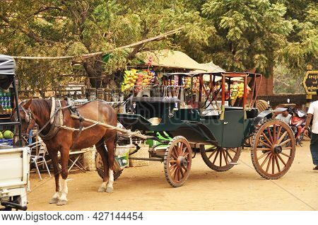 Burmese Sit Ride Horse Drawn Carriages And Waiting For Burma People And Foreign Travelers Use Servic
