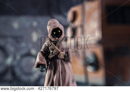 JUNE 12 2021:scene from Star Wars with Jawas on Tatooine selling droids  - Hasbro action figure