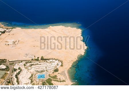 View From The Airplane Window Of The Mountains And Sea Resort Of Egypt