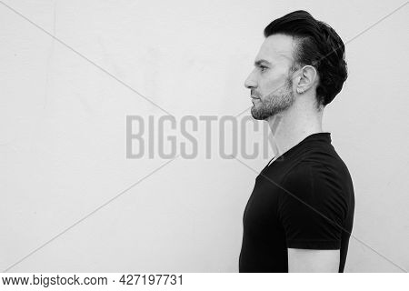 Black And White Portrait Of Handsome Italian Man Profile View