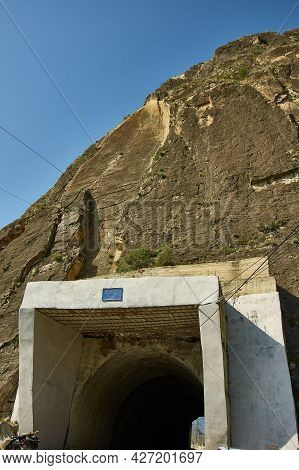 Tunnel. Gunib District,, Big Mountain Formation In The Background. Dagestan, Russia