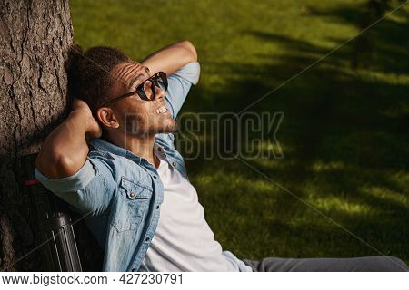 Mirthful Person Looking Happy While Being Outdoors