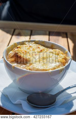 French Caramelized Onion Soup With Croutons And Gruyere Cheesse From Oven