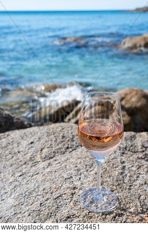 Summer Time In Provence, Glass Of Cold Rose Wine On Sandy Beach And Blue Sea Near Saint-tropez, Var
