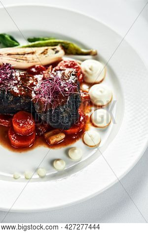 Braised Beef Cheeks With Vegetables, Cooking Beef Cheeks In Red Wine Sauce With Fried Spinach Leaves