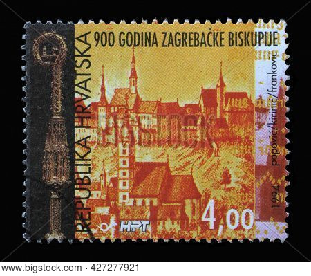 ZAGREB, CROATIA - AUGUST 29, 2014: A stamp printed in Croatia shows Bishop's crosier and view of Zagreb by Valvasor, 900th Anniversaries of Zagreb and Zagreb Bishopric, circa 1994