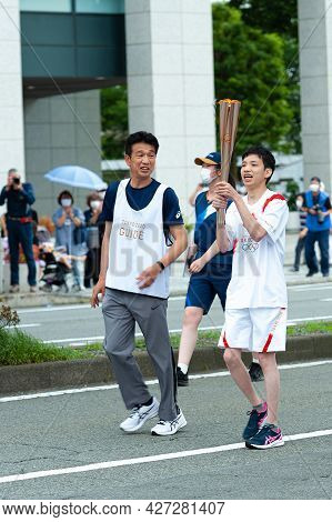 Fuji City, Shizuoka-ken, Japan - June 24, 2021: Tokyo 2020 Olympic Torch Relay In Fuji City.