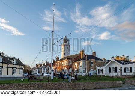 A View Of Southwold Inshore Lighthouse At Sunset On A Cold Autumn Evening