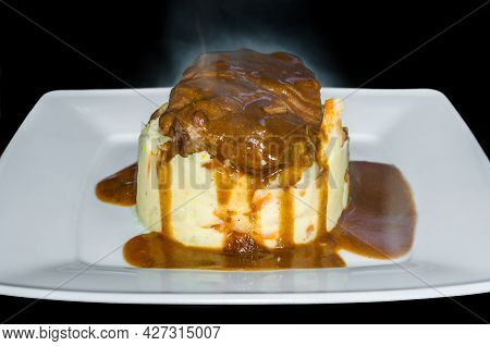 A Dish Of Dutch Meatballs (gehaktballen) Served With Mashed Potatoes