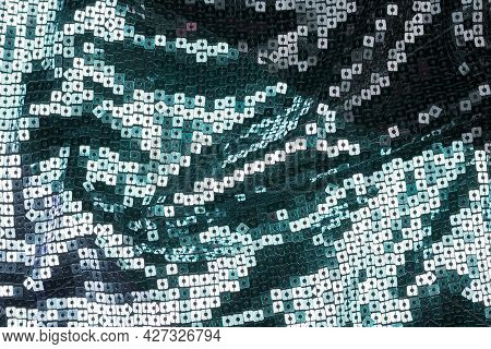 Texture Of The Surface Of The Fabric Made Of Sequins. Fashion Fabric Glitter, Sequins. Beautiful Shi