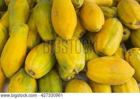 Papaya Fruit In The Traditional Colombian Market - Carica Papaya