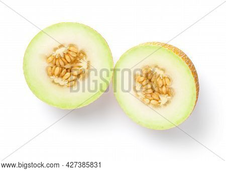 Galia Melon Cut In Half Isolated On White Background. View From Above