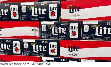 Cases Of Cans Of Miller Lite Beer At A Grocery Store Waiting For Customers To Purchase.
