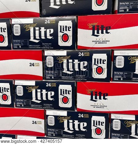 Cases Of Cans Of Miller Lite Beer At A Grocery Store Waiting For Customers To Purchase.