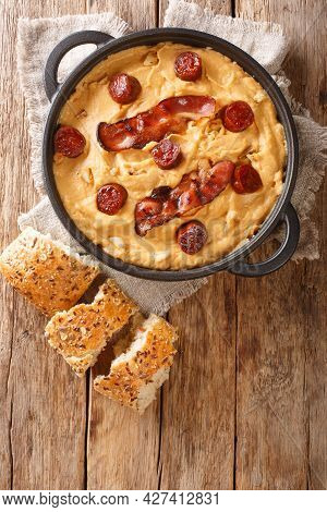 Gacha Manchega A Traditional Dish From La Mancha Spain Close-up In A Pan On The Table. Vertical Top 
