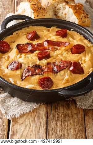 Gacha Manchega A Traditional Dish From La Mancha Spain Close-up In A Pan On The Table. Vertical