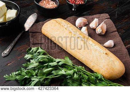 Ingredients For Garlic And Gerbs Bread Baguette Set, On Old Dark  Wooden Table Background