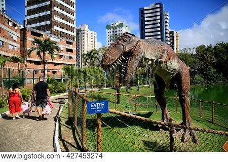 Dinosaur Sculpture In Park
