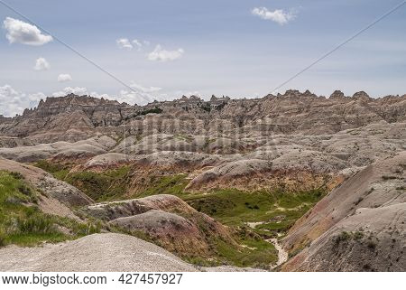 Badlands National Park, Sd, Usa - June 1, 2008: A Bad Place To Loose A Calf Is This Wirwar Of Geolog