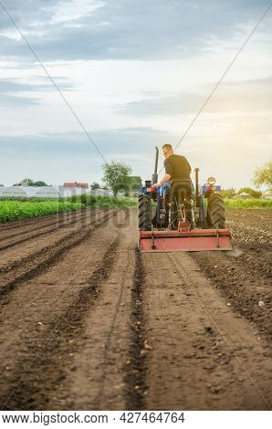 A Farmer Grinds Up Solid Soil To Plant New Crops. Development Of Agricultural Economy, Introduction 