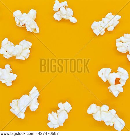 Popcorn On Yellow Background Photo Frame. Top View. Watch Movie. Cinema Backdrop. Video Streaming Se