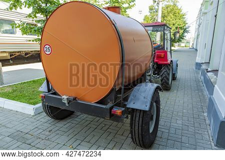 Orange Water Tank For Watering City Streets