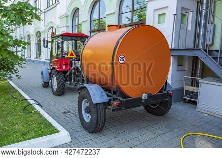 Orange Water Tank For Watering City Streets