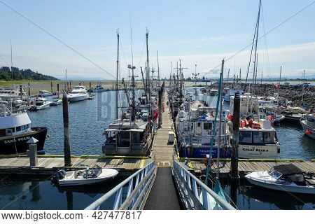 Comox, British Columbia, Canada - July 8th, 2021: A Marina With Docks Full Of All Types Of Boats On 