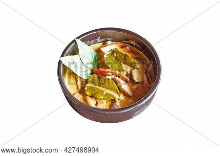 Brown Bowl With A Red Curry Isolated On White
