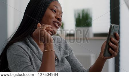 African American Student Talking With Friend Explaining Online Math Lesson During Digital Videocall 