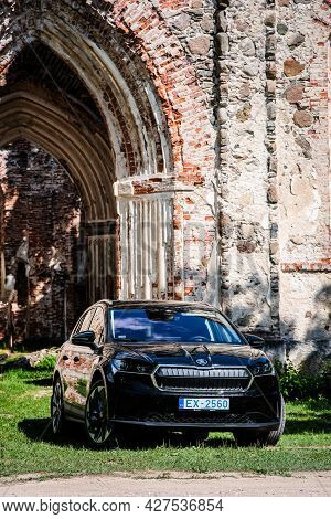 Madona, Latvia - July 20, 2021: New Skoda Enyaq Iv, A Suv Electric Car. Defocused