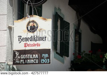Ljubljana, Slovenia - June 13, 2021: Benediktiner Weissbier Logo In Front Of A Slovenian Bar. Benedi
