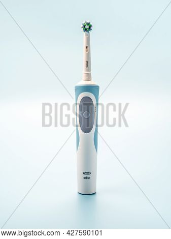 Russia, Moscow, July 22, 2021: Braun Oral-b Toothbrush Head Cross Action. Modern Electric Toothbrush