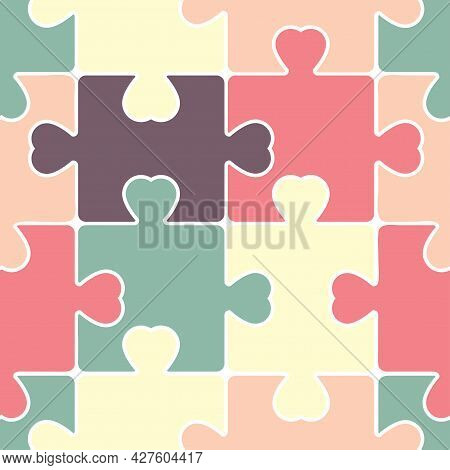 Heart-shaped Seamless Pattern Of Multicolored Puzzles. Abstract Background From Slices For Valentine