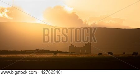 Sunset At Ballycarberry Castle On The Ring Of Kerry In Ireland.