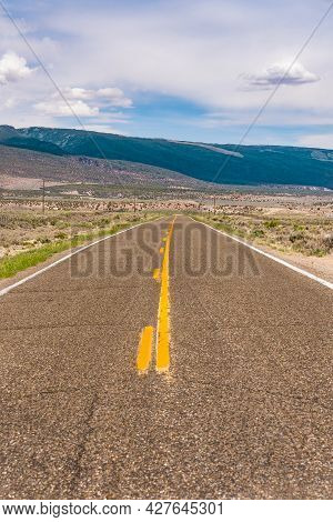 Long Straight Road In The Mountain Wildnerness