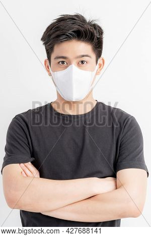Stop Civid-19 , Asian Man Wearing Face Mask Protect Spread Covid-19 Coronavirus On White Background