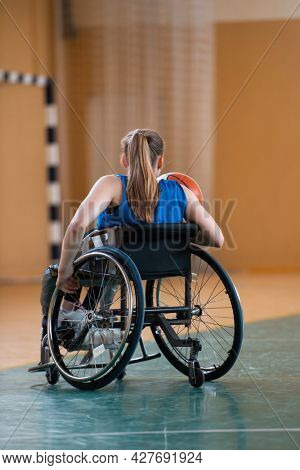 photo of the basketball team of war invalids with professional sports equipment for people with disabilities on the basketball court