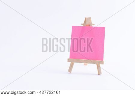 Wooden Easel Miniature With Blank Colored Square Canvas Or Memo Paper - Mockup. Mini Wooden Stand Wi