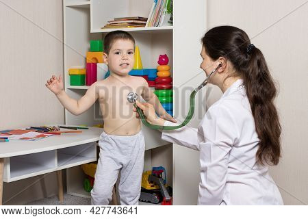 The Pediatrician Examines The Lungs And Heart Of A Slave Patient Using A Phonendoscope. Ausculation,